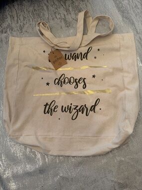 Warner Bros. Cream Canvas Tote with Gold Foil Script